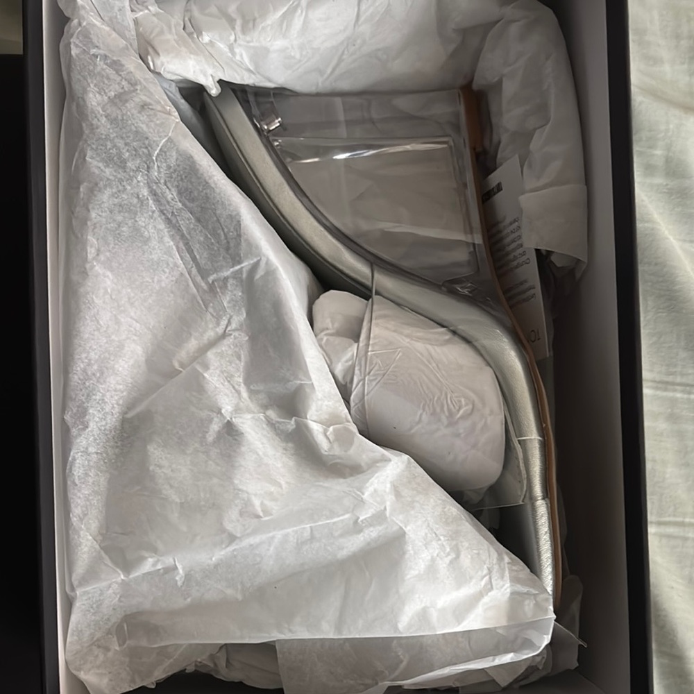Tony Bianco clear & silver wedge heels.